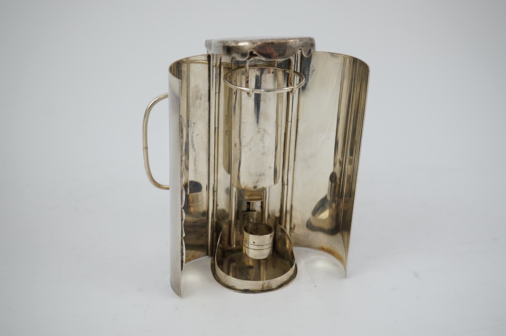 A Victorian silver travelling coach lamp by Thomas Johnson I, in original fitted leather case, retailed by Leuchers, 38 Piccadilly, London